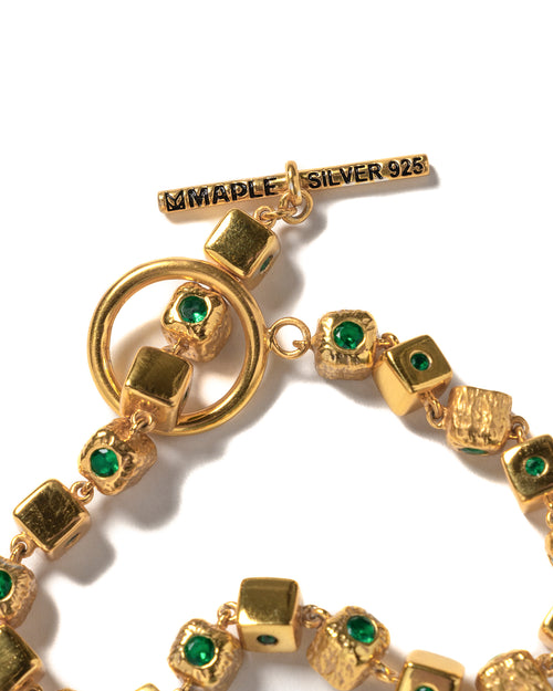 MAPLE Romi's Bracelet 14K Gold Green Emerald Gemstones toggle clasp and bracelet closeup