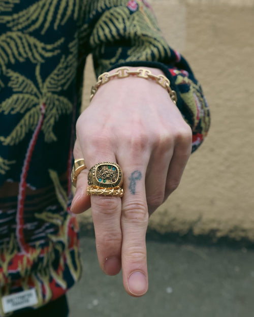 MAPLE Weekend Champion Ring 14K Gold Topaz on pointer finger