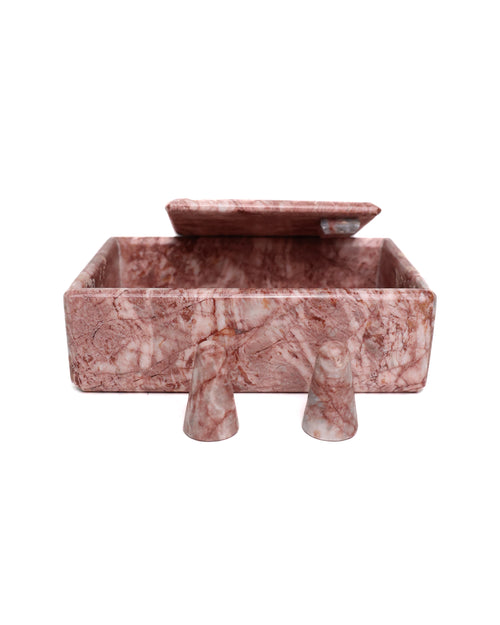 Pink marble jewelry box on a white background