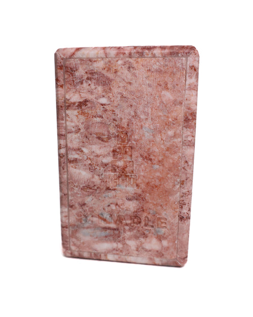 Pink marble jewelry box underside on a white background