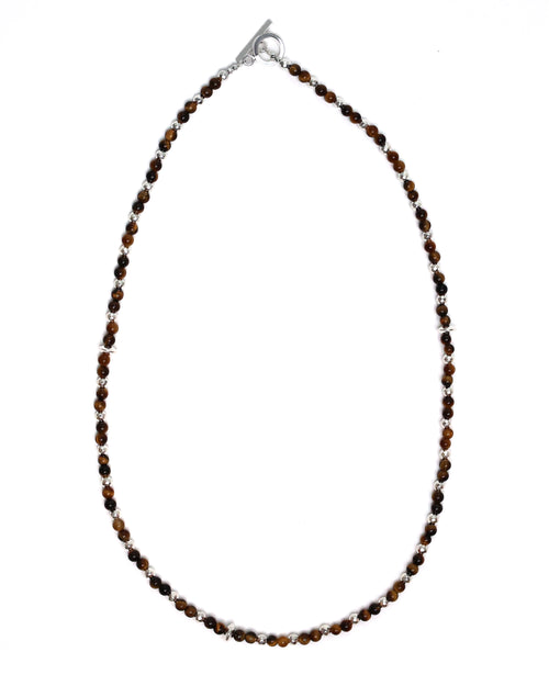 Necklace with brown beads on a white background